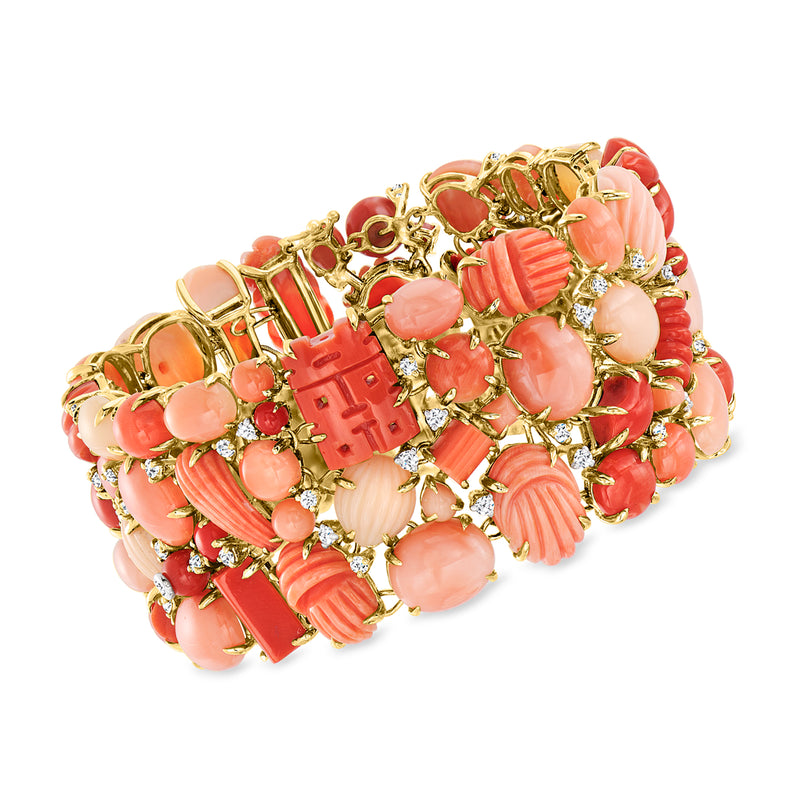 Vintage coral-pink gemstone bracelet with gold-tone links and small diamond accents