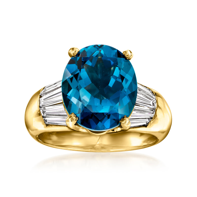 18kt yellow gold ring with oval London blue topaz center and baguette diamond sides