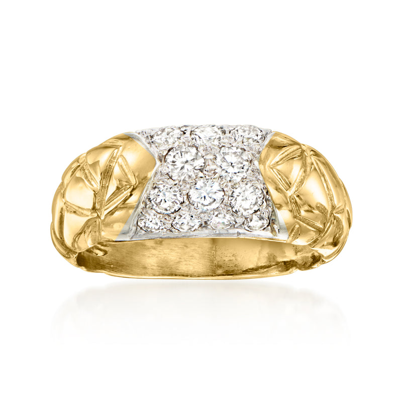 Vintage yellow gold diamond cluster ring with leaf-patterned side gallery.