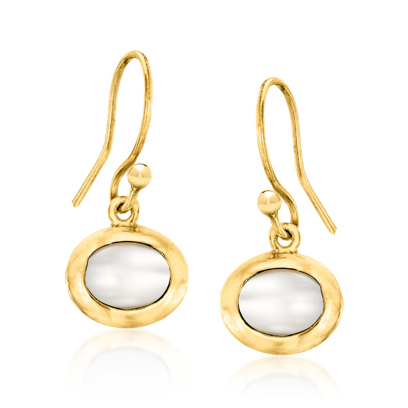 Gold-tone white oval drop earrings with small chain dangle