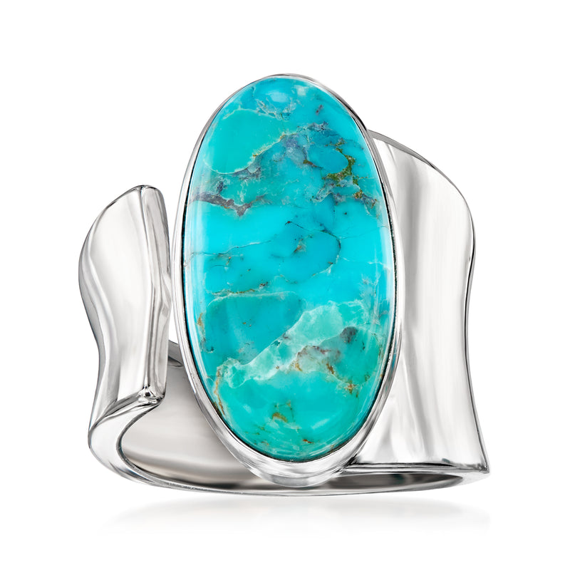 Sterling silver wrap ring with oval turquoise stone, open cuff design