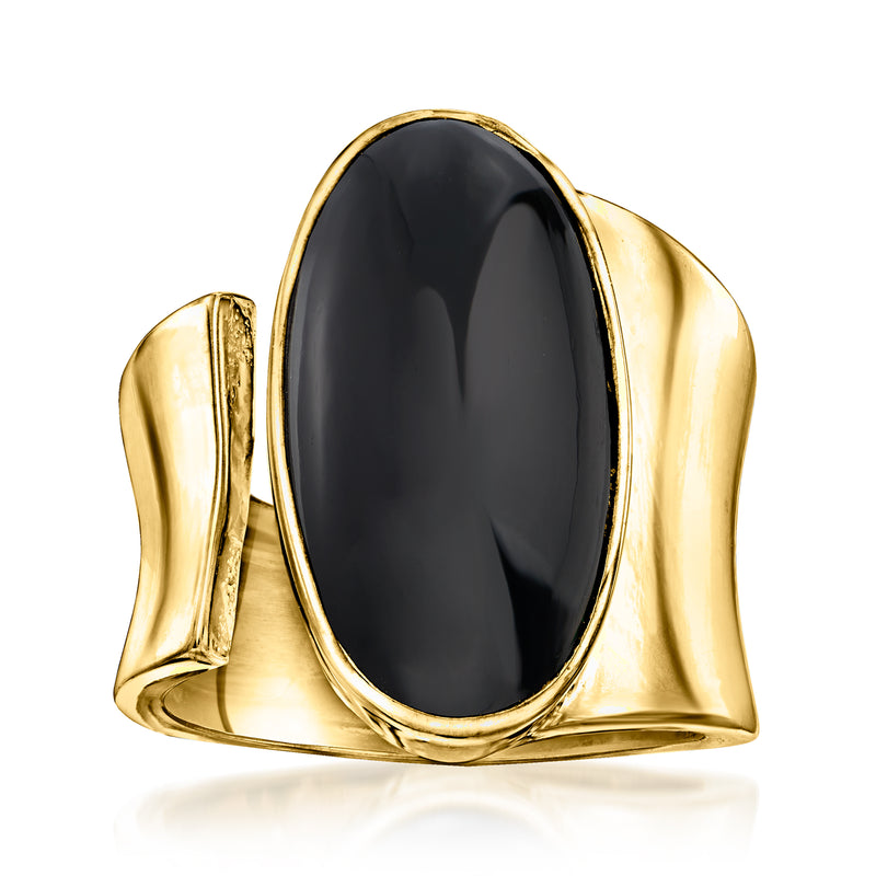 Gold-tone oval onyx wrap ring with raised curved band and glossy black center stone