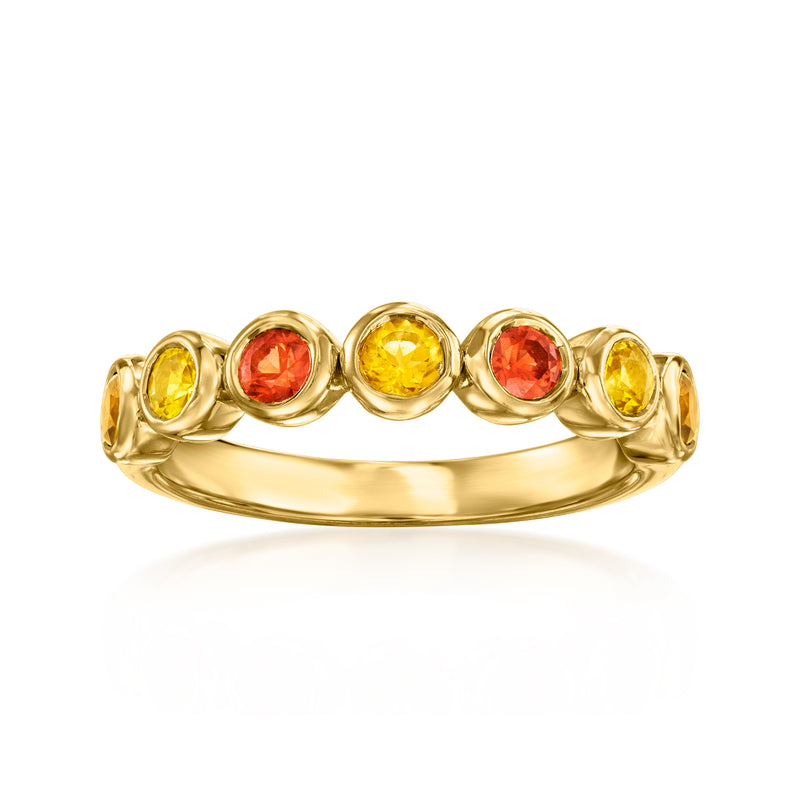 Gold ring with alternating orange and yellow round gemstones and yellow citrines