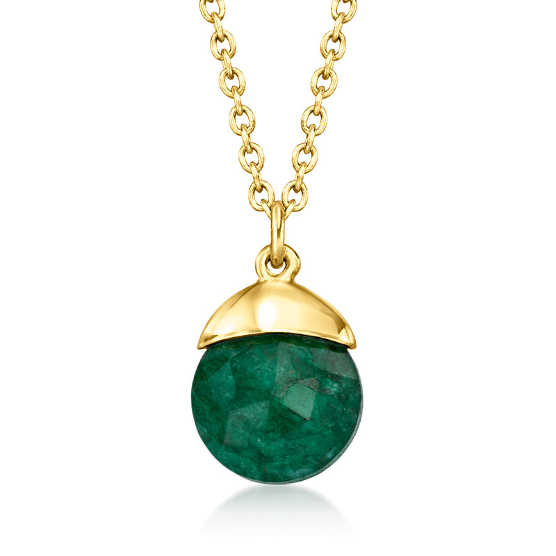Gold pendant necklace with a round green emerald-style stone in a gold bezel
