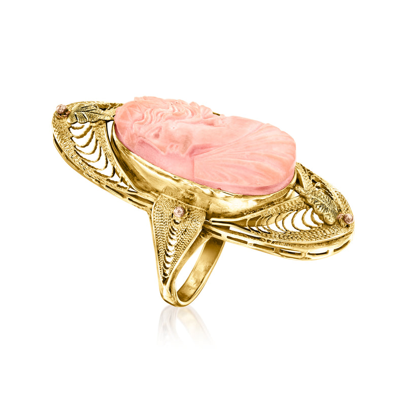 10kt yellow gold cameo ring with pink oval center, carved sides, and prongs