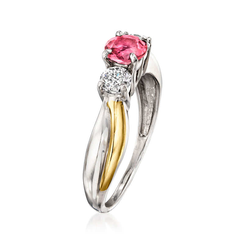 Two-tone 14kt gold ring angled view with pink tourmaline center and diamond side stones.
