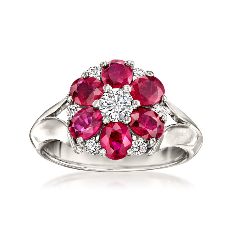 18k white gold flower ring with oval ruby petals and round diamond center