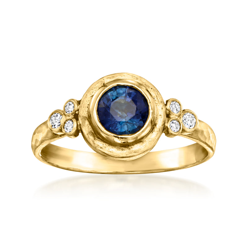 Vintage 18k yellow gold ring with round blue sapphire and four diamond accents