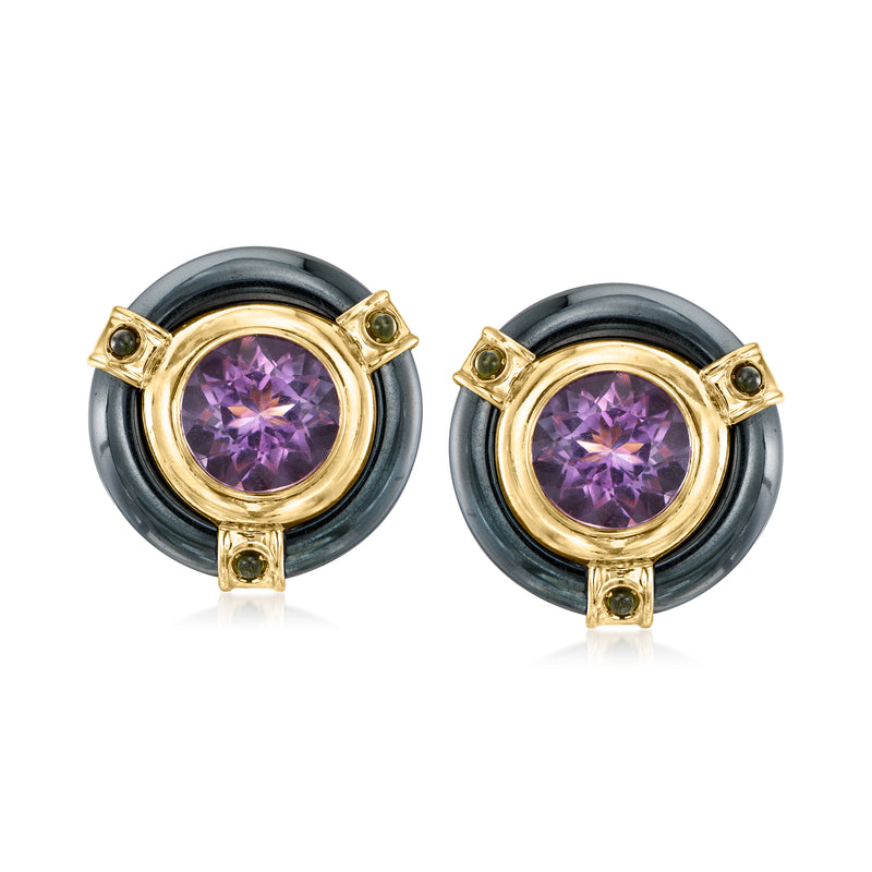 Yellow gold clip earrings with round purple amethyst center, dark gray halo, green accents