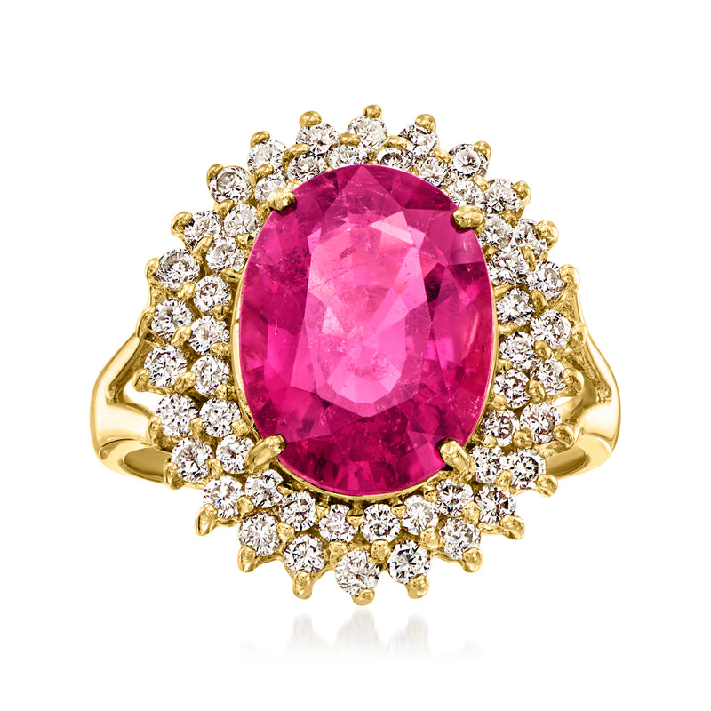 Vintage oval pink tourmaline ring with diamond halo in 14k yellow gold