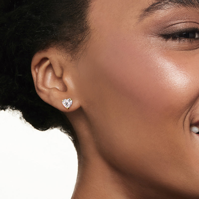 Heart stud earrings in 14kt yellow gold with clear CZ heart stone