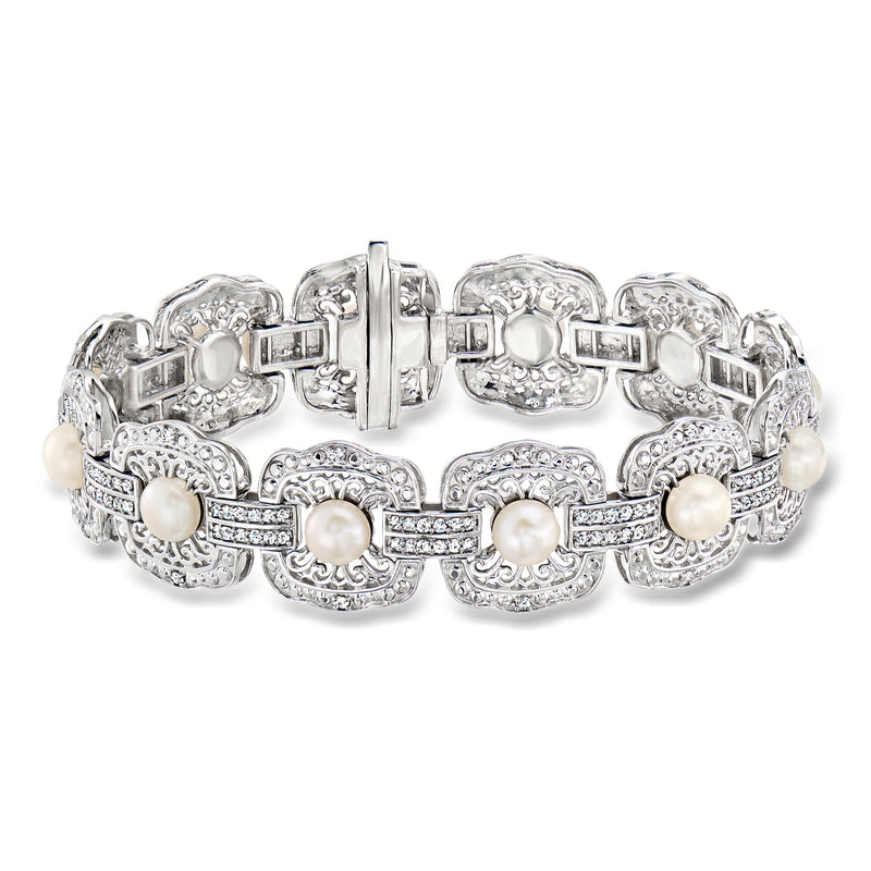 Sterling silver bracelet with cultured pearl clusters and diamond accents in a row