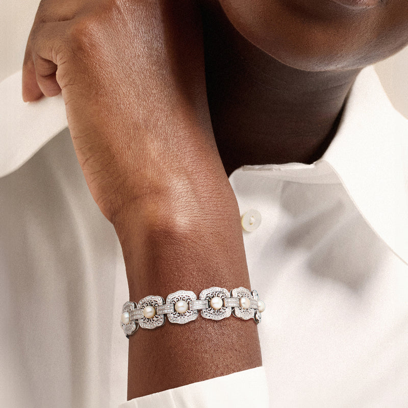 Sterling silver bracelet with cultured pearl links and sparkling diamond accents