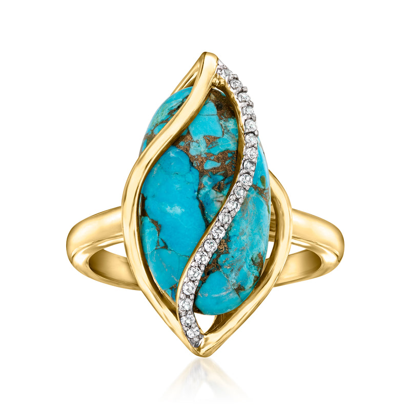 Gold swirl ring with oval turquoise stone and small white rhinestone accents