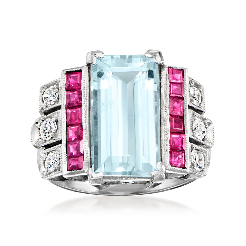 Platinum vintage ring with rectangular aquamarine center, ruby baguette sides, diamond accents