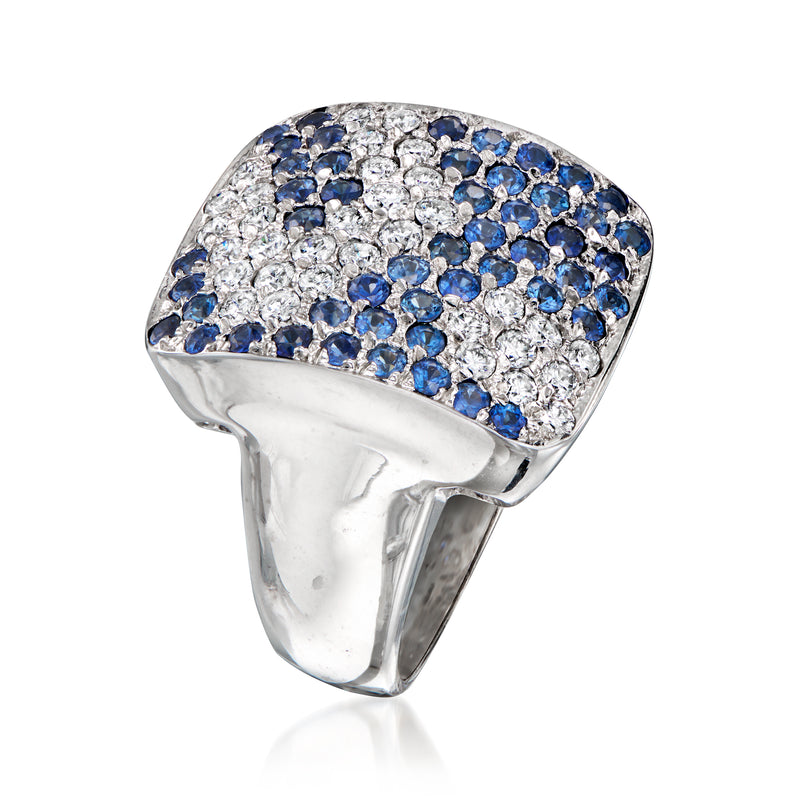 White gold ring with pavé sapphires and diamonds on a wide domed top