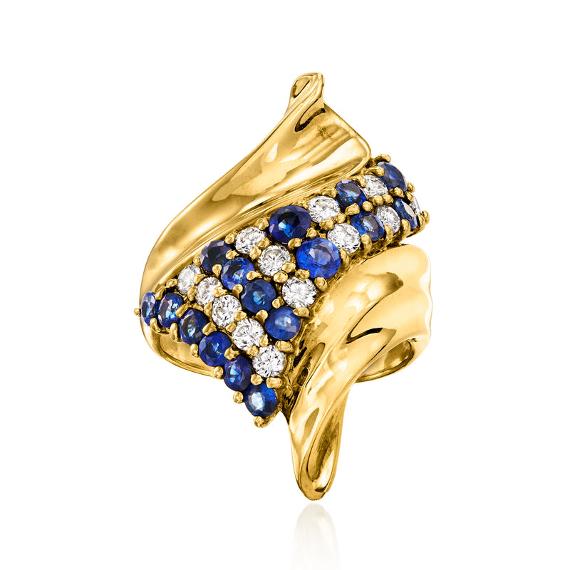 Swirl ring in 18kt yellow gold with blue sapphires and white diamonds