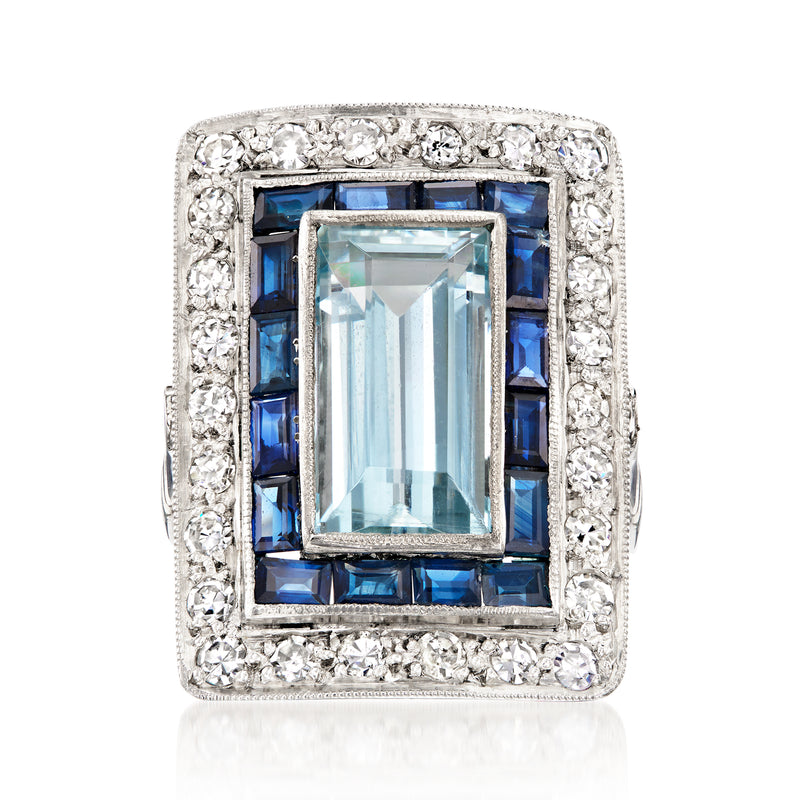Platinum vintage ring: rectangular aquamarine, blue sapphires, diamond halo