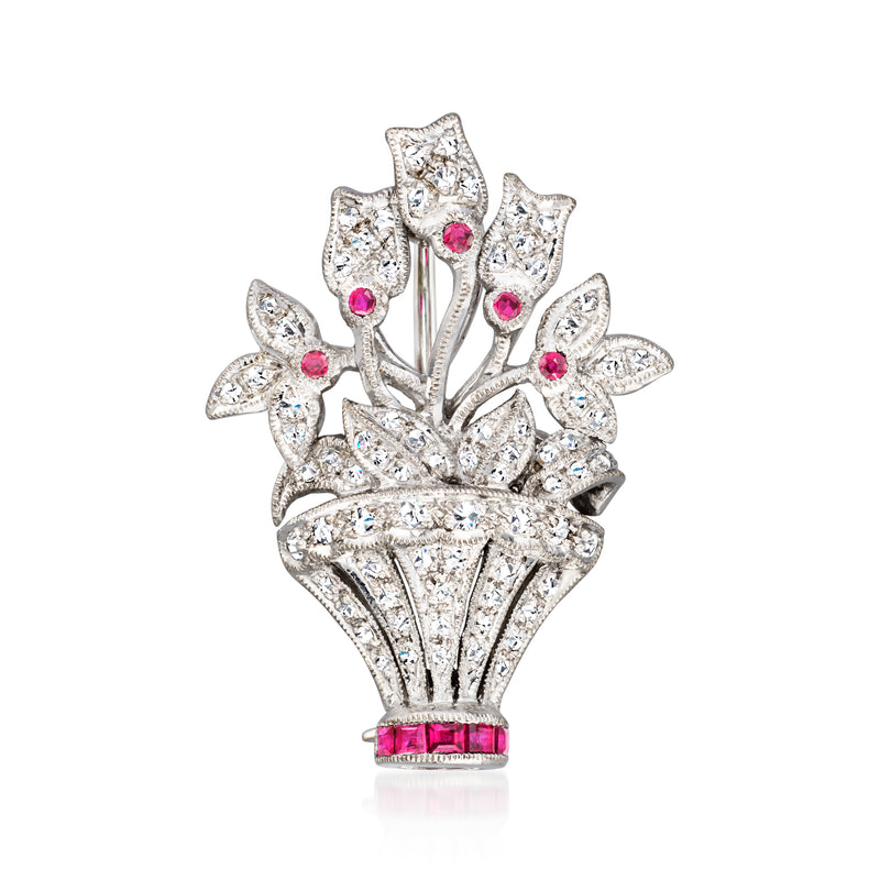 Vintage flower basket pin in 18kt white gold with diamond accents and pink ruby gems