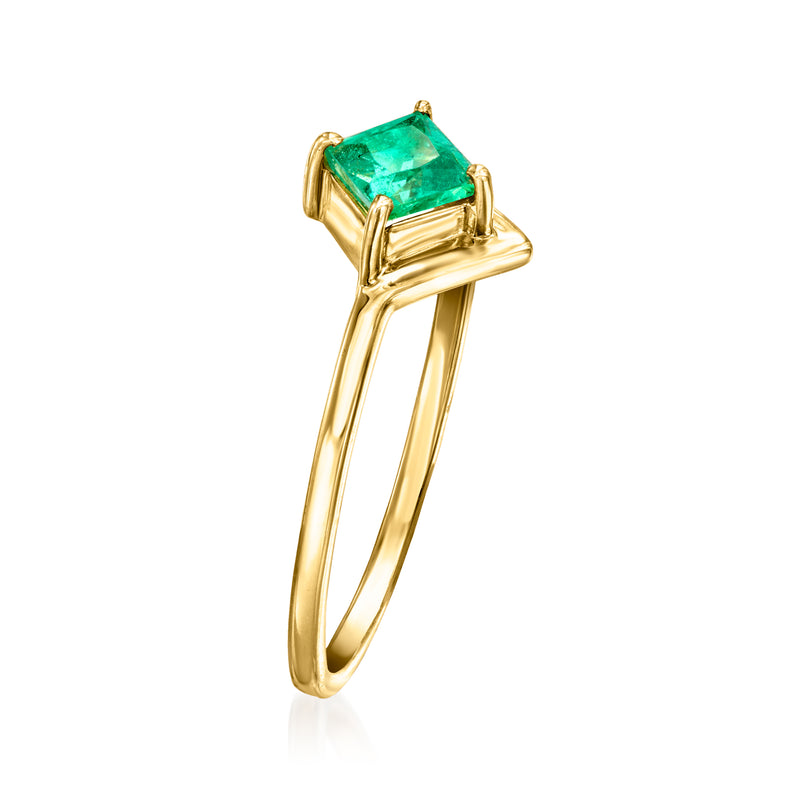 14kt yellow gold ring with green emerald-cut gemstone in open geometric band