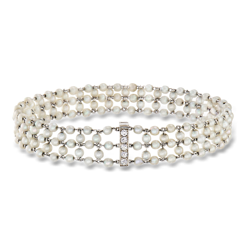Cultured pearl and diamond line bracelet, multi-strand white gold setting