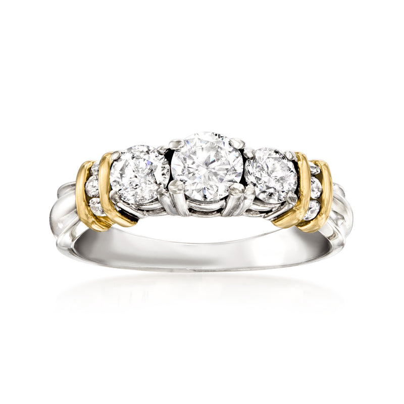 Two-tone 14kt gold diamond ring with five round bezel-set stones, yellow and white bands