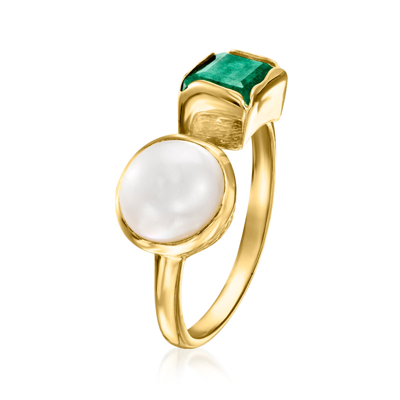 Gold ring with green emerald top and white pearl side, polished bezel settings