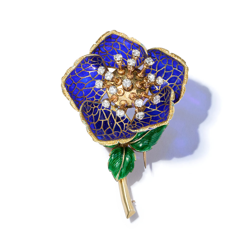 Blue enamel floral pin with clear stones, gold rim, green enamel leaves and gold pin stem
