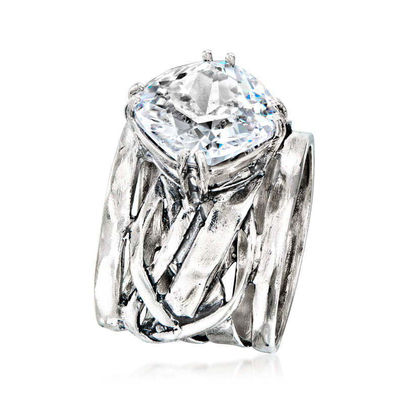 Sterling silver CZ ring with big round-cut clear center stone and sculpted side prongs