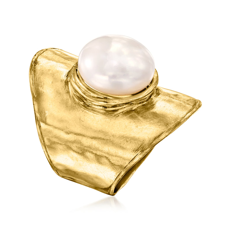Hammered gold ring with large round white pearl on raised band