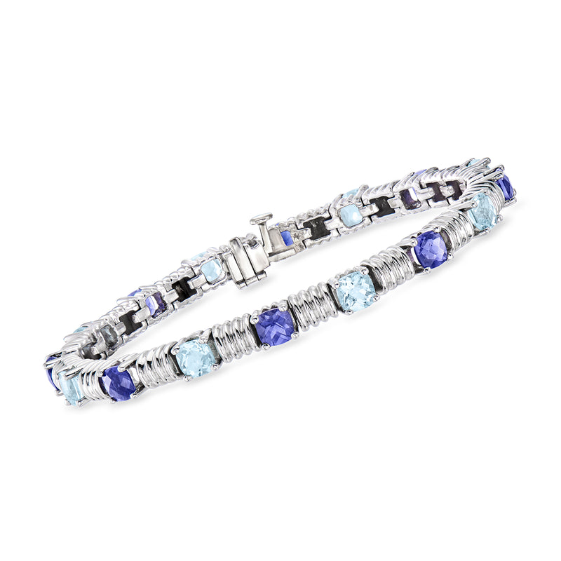 Vintage white gold bracelet with blue topaz and purple iolite gemstones in prong settings