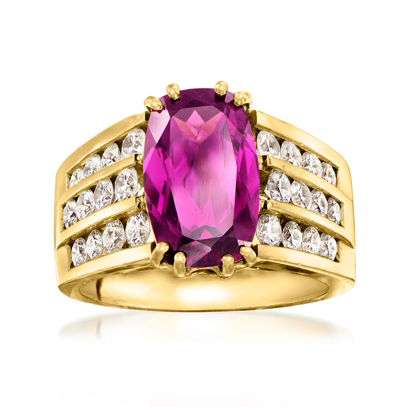 14kt yellow gold ring with large purple rhodolite center, diamond side stones