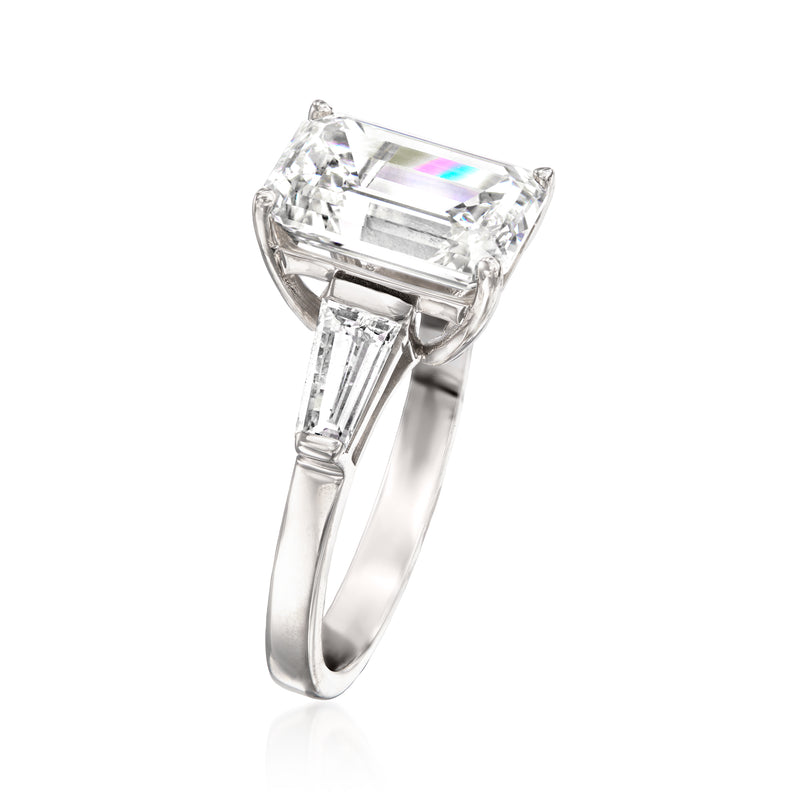 Emerald-cut lab-grown diamond ring in white gold, angled view with baguette accents