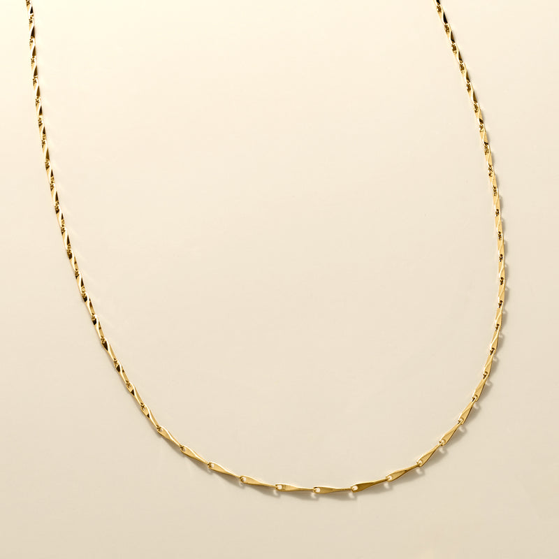 Gold vermeil twisted-bar necklace featuring a twisted oval-link chain