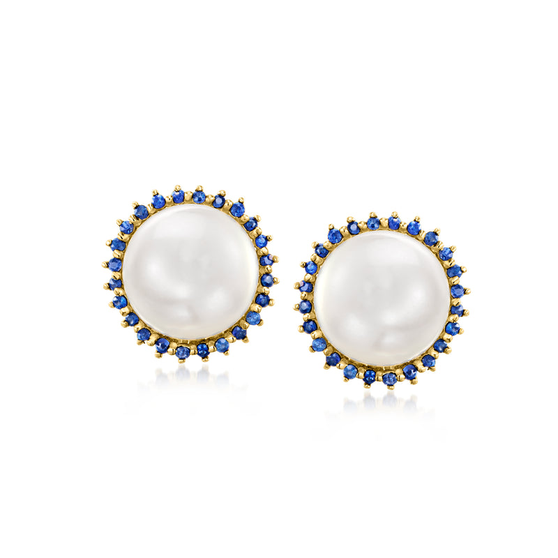 Cultured pearl stud earrings in yellow gold, blue sapphire halo surrounds round white pearls