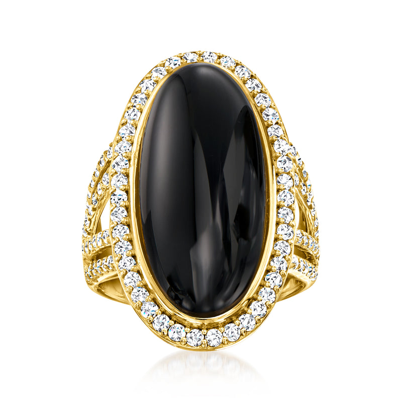 Onyx ring with white topaz halo in 18kt gold over sterling
