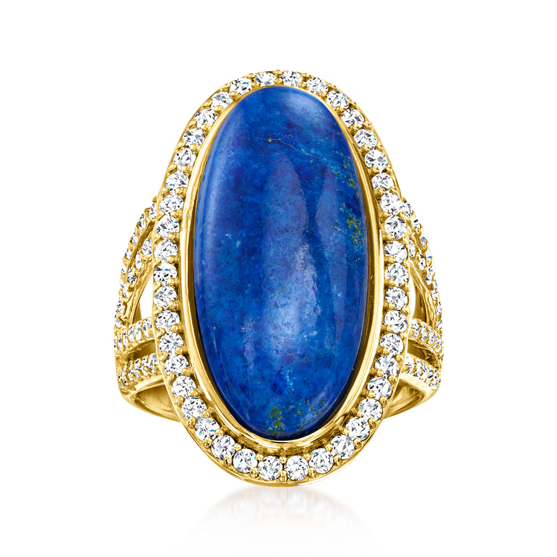 Oval lapis gemstone ring in 18kt gold over sterling with white topaz halo and side stones