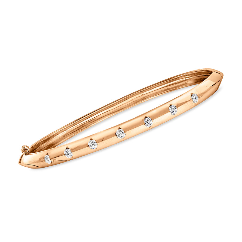 Vintage 14kt yellow gold diamond bangle bracelet with round prong-set stones