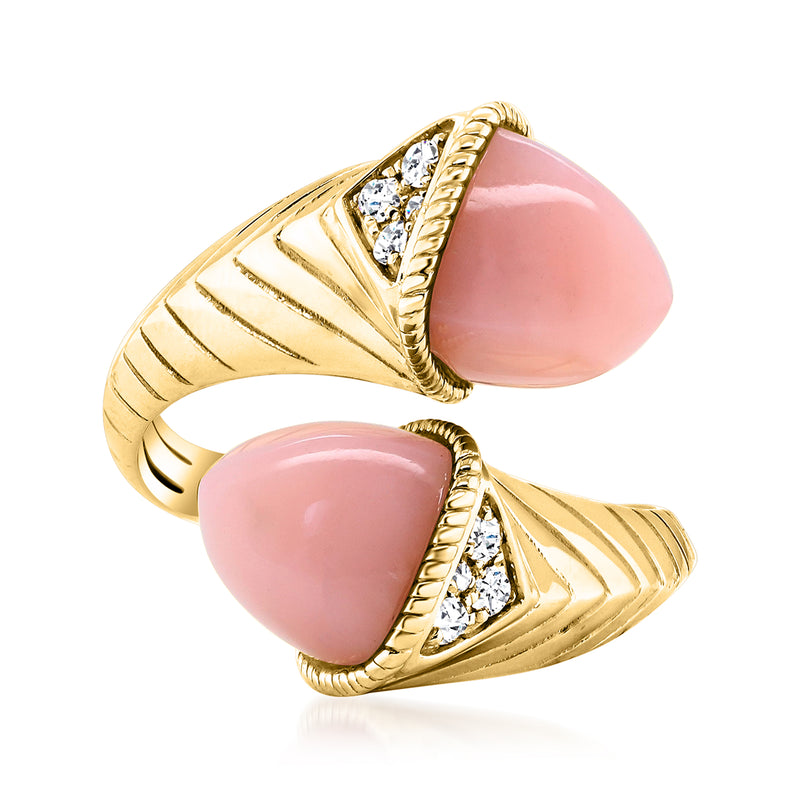 Yellow gold bypass ring with pink cabochon stones and small diamond accents