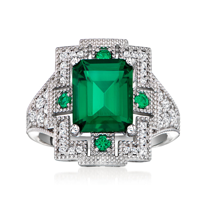 Sterling silver ring with large emerald-cut green center stone and pavé CZ halo