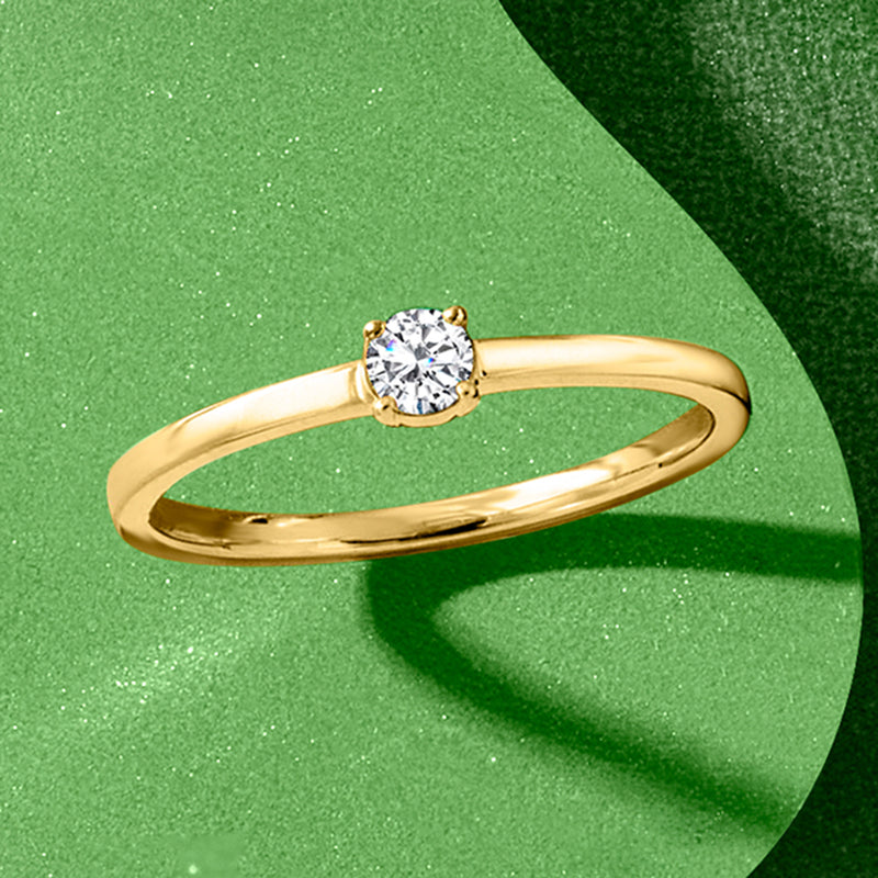 14kt yellow gold solitaire diamond ring with round center stone and slim band
