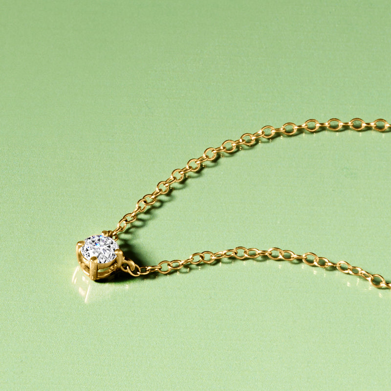14kt yellow gold solitaire diamond necklace, round diamond on chain