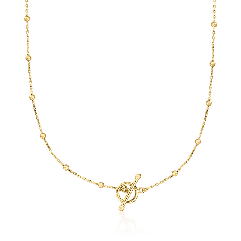 Gold bead station toggle necklace with round beads and toggle clasp