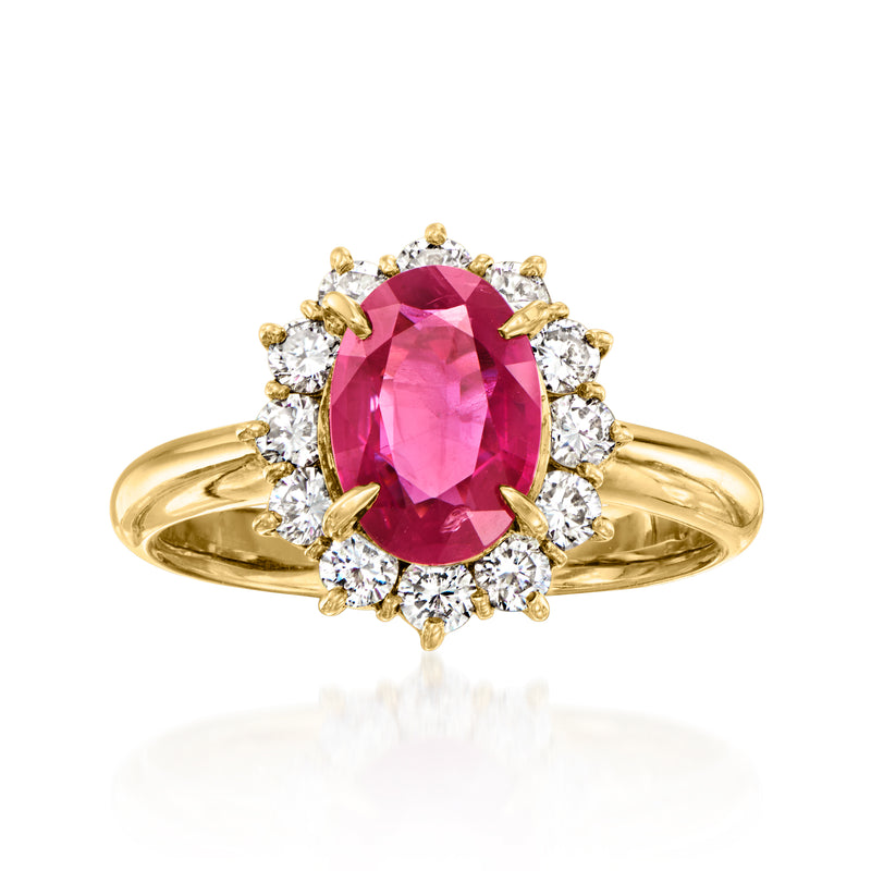 18kt yellow gold ring with oval ruby center and diamond halo on prong setting