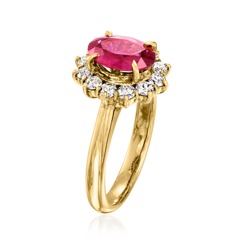 18kt yellow gold ring with oval ruby in three-part diamond surround, side view
