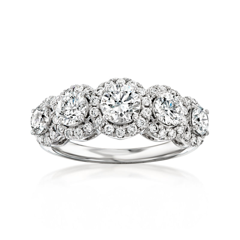 Five-stone diamond ring in white gold, oval center stone with round side stones
