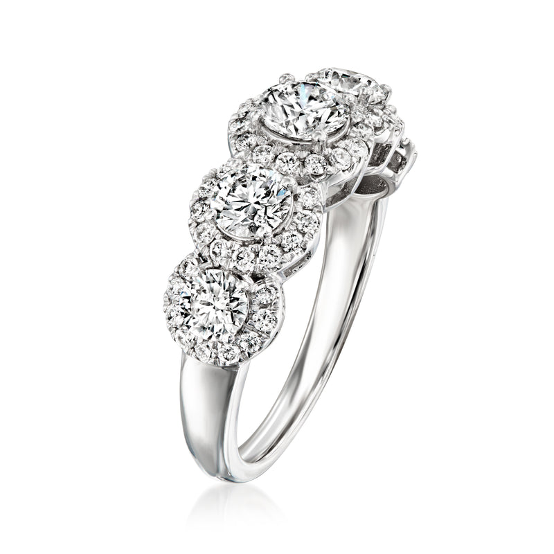 Five-stone diamond ring in white gold, side view with five round stones in prongs