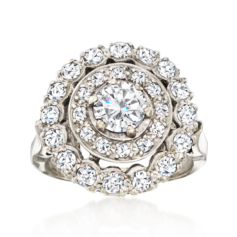 Vintage diamond cluster ring in 14kt white gold, round center with halo of small diamonds