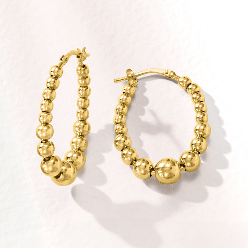 Pair of gold over sterling beaded oval hoop earrings with clasp backs