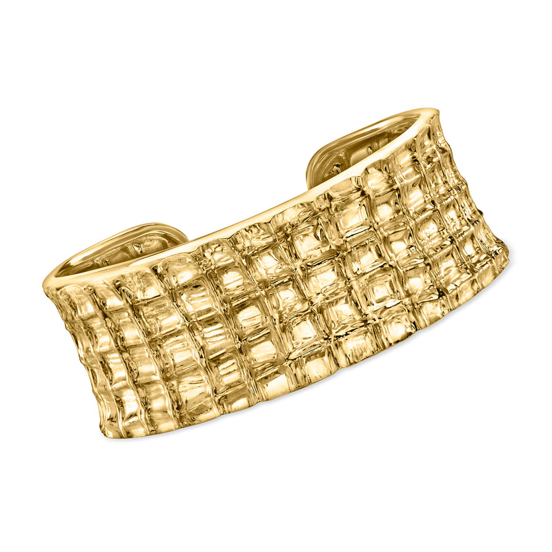 Gold-tone cuff bracelet with grid-pattern raised links, wide open design